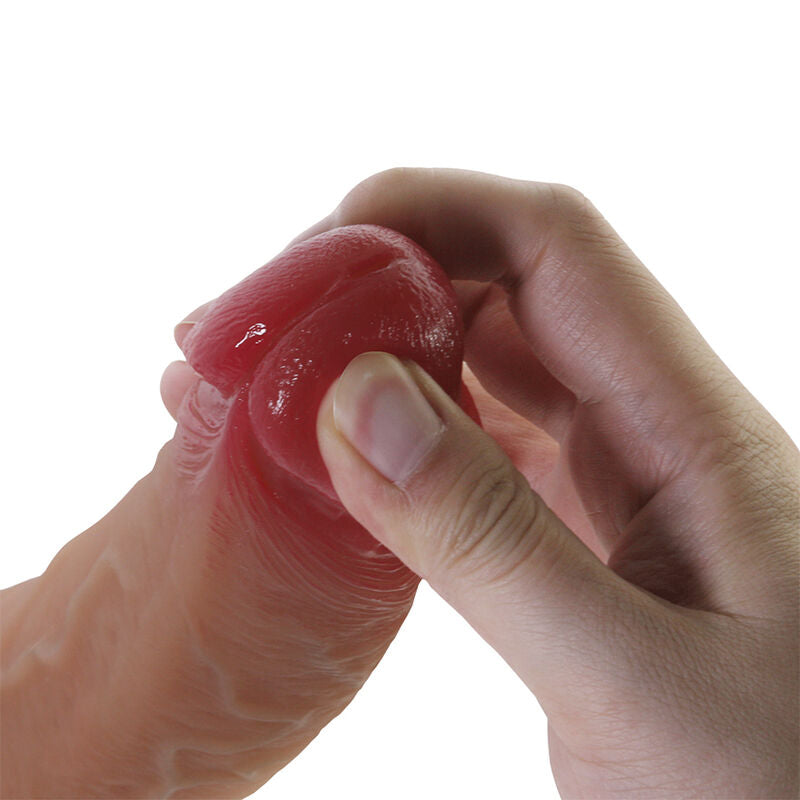 Main comprimant le gland rouge en silicone du Torin-Plus