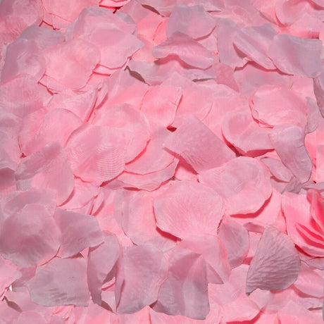 One hundred pink fabric rose petals for intimate pleasure.