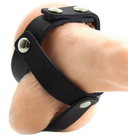 Séparateur de couilles en simili cuir noir à boutons-pression.