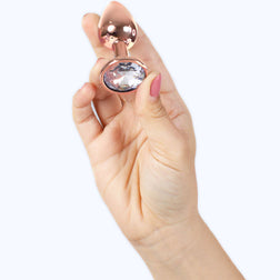 Plug métal or rose poli 7 cm taille S — vue de profil