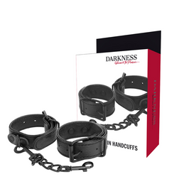 Menottes modèle fétiches en simili cuir texturé noir mat en PVC noir pour le plaisir intime.