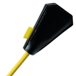 Détail de la base de l'accessoire Cravache plumeau jaune et noire