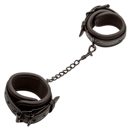 CALEXOTICS NOCTURNAL POIGNETS EN CUIR REGLABLES NOIRS