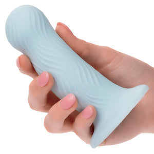 Plug ondulé silicone liquide bleu avec ventouse — texture visible
