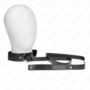 Collare KINK nero su un manichino, con anello argentato davanti e guinzaglio coordinato.