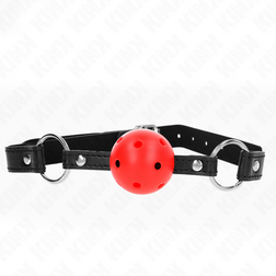 Bâillon à boule rouge ajourée avec sangle noire et deux anneaux latéraux argentés