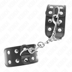 Gros plan sur la texture de l'accessoire Menottes bondage noires à double rangée de clous
