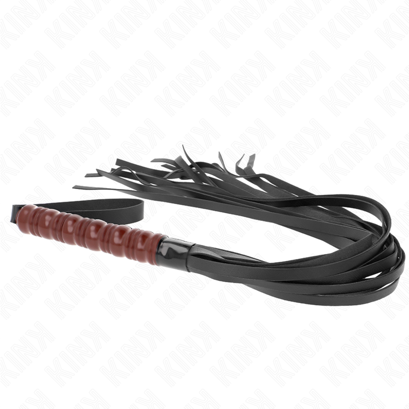 Martinet KINK posé à plat, manche acajou à gauche et faisceau de lanières noires à droite
