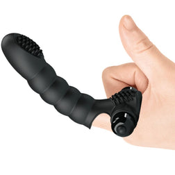 Alexander Vibrator an einem Finger getragen