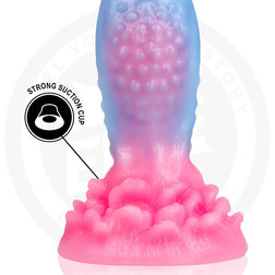 Gros plan sur la base ventouse robuste du gode en silicone