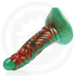 Gode en silicone incliné montrant la base ventouse large et stable