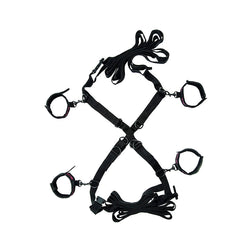 Kit bondage Scandal Over The Bed Cross noir avec quatre menottes rembourrées.
