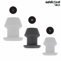 Plug tunnel ouvert silicone taille M 8,7 cm — en situation