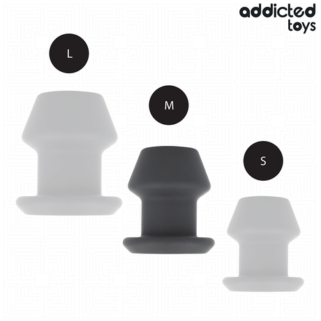 Plug tunnel ouvert silicone taille M 8,7 cm — en situation