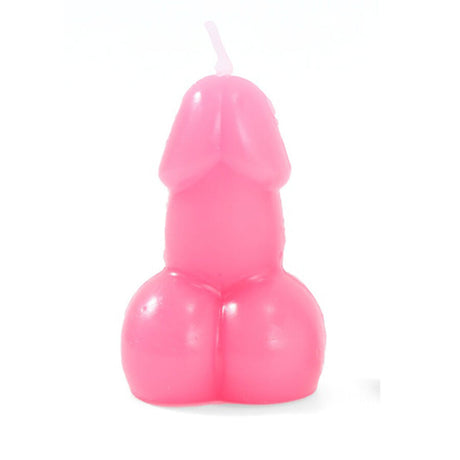 Fuchsia wax penis candle with a wick on a white background.