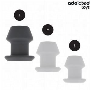 Plug tunnel ouvert silicone taille XXL 10,4 cm — en situation