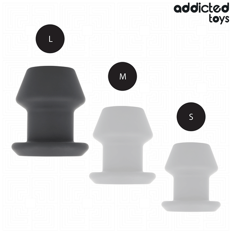 Plug tunnel ouvert silicone taille XXL 10,4 cm — en situation