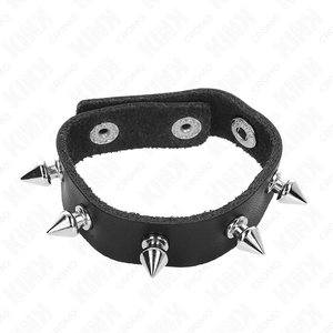Cockring cuir clouté pointes métal — vue détaillée