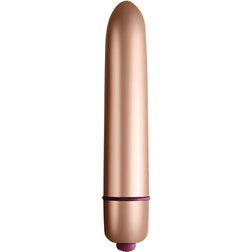 Gros plan sur le vibrateur lisse avec finition métallique dorée
