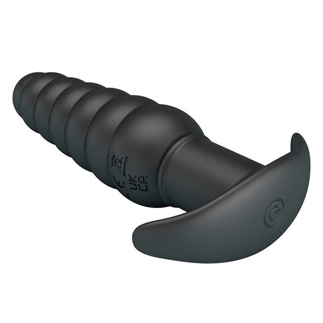 Plug anal vibrant silicone nervuré 11 cm base T-stop — en situation