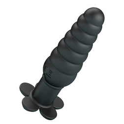 Gros plan sur la forme spiralée du plug anal vibrant
