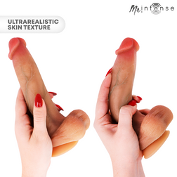 Realistic Bruce M silicone dildo with testicles, 20 cm long and 4.5 cm in diameter.