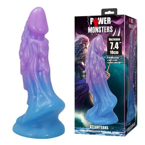 Gode monstre Atlanteans violet et bleu posé à côté de sa boîte Power Monsters