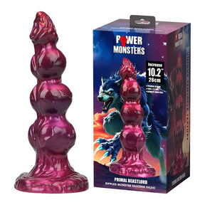Gode monstre Primal Beastlord 26 cm posé à côté de sa boîte Power Monsters