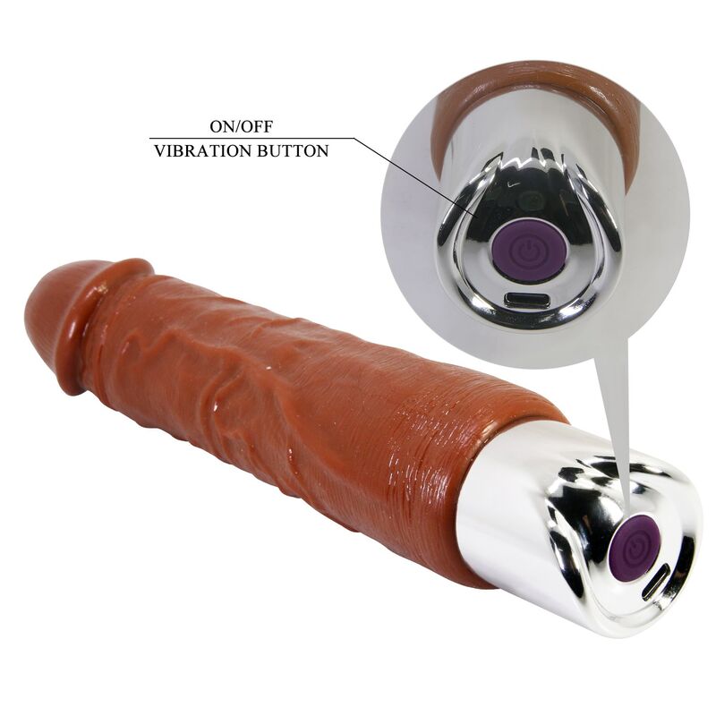 Vibromasseur Pro marron avec gros plan du bouton dans sa base argentée