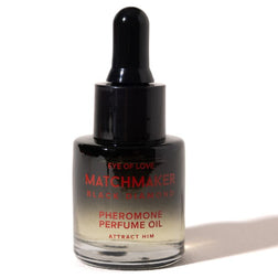 Flacon noir à pipette de l’huile de parfum Matchmaker Black Diamond, avec la mention Attract Him