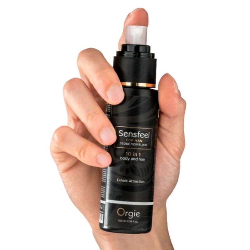 Main tenant le spray Sensfeel 10 en 1 corps et cheveux