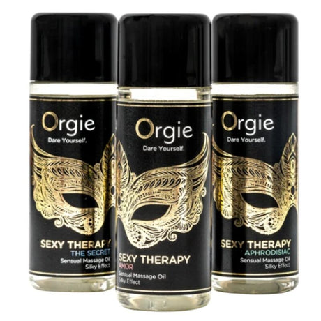 Trois flacons de 30 ml Sexy Therapy ORGIE, avec Amor devant The Secret et Aphrodisiac
