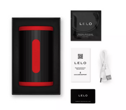 Coffret du LELO F2S Double Sonic rouge avec câble de recharge USB et documents fournis