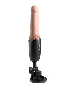 Gode Thrusting Cock Pro monté sur sa ventouse orientable, avec les commandes sur la poignée