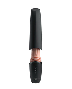 Capuchon noir recouvrant partiellement la tige du Thrusting Cock Pro pour le rangement