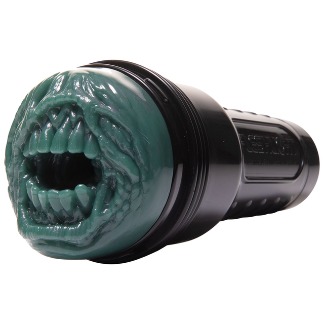 Masturbateur Fleshlight Fantasy Zombie Mouth, bouche verte et coque noire vus de trois quarts.