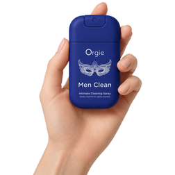 Flacon Men Clean bleu tenu dans une main pour montrer son format compact