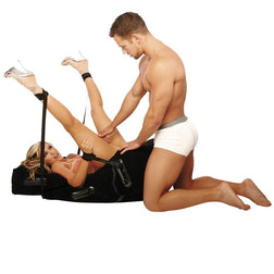 Coussin de position gonflable Position Master en PVC floqué noir avec poignées.