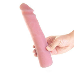 Realistic Skin Touch dildo in flesh-coloured silicone, 23.0 cm, for intimate pleasure.